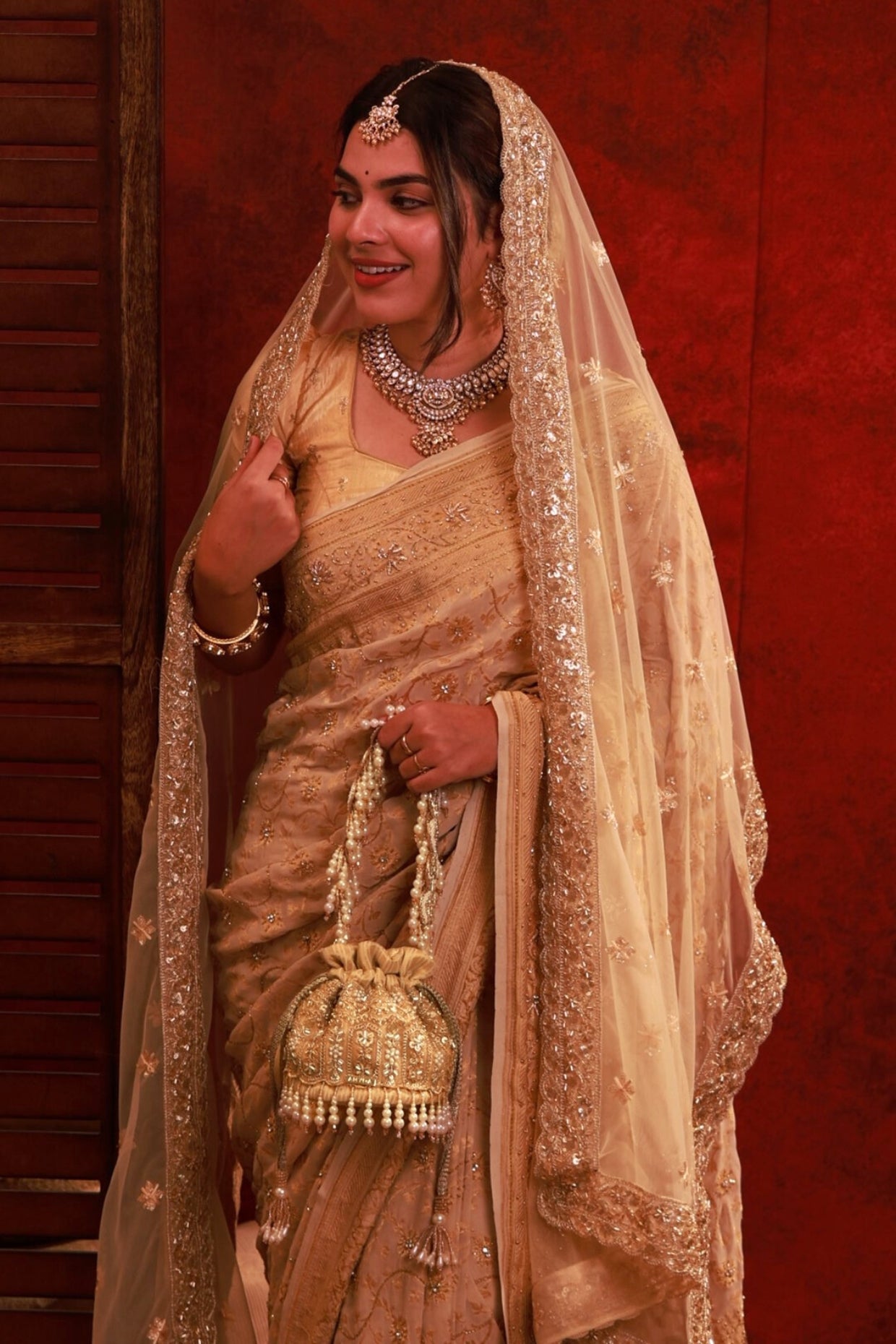 SAJNI PEARL EMBROIDERED MINI POTLI - GOLD