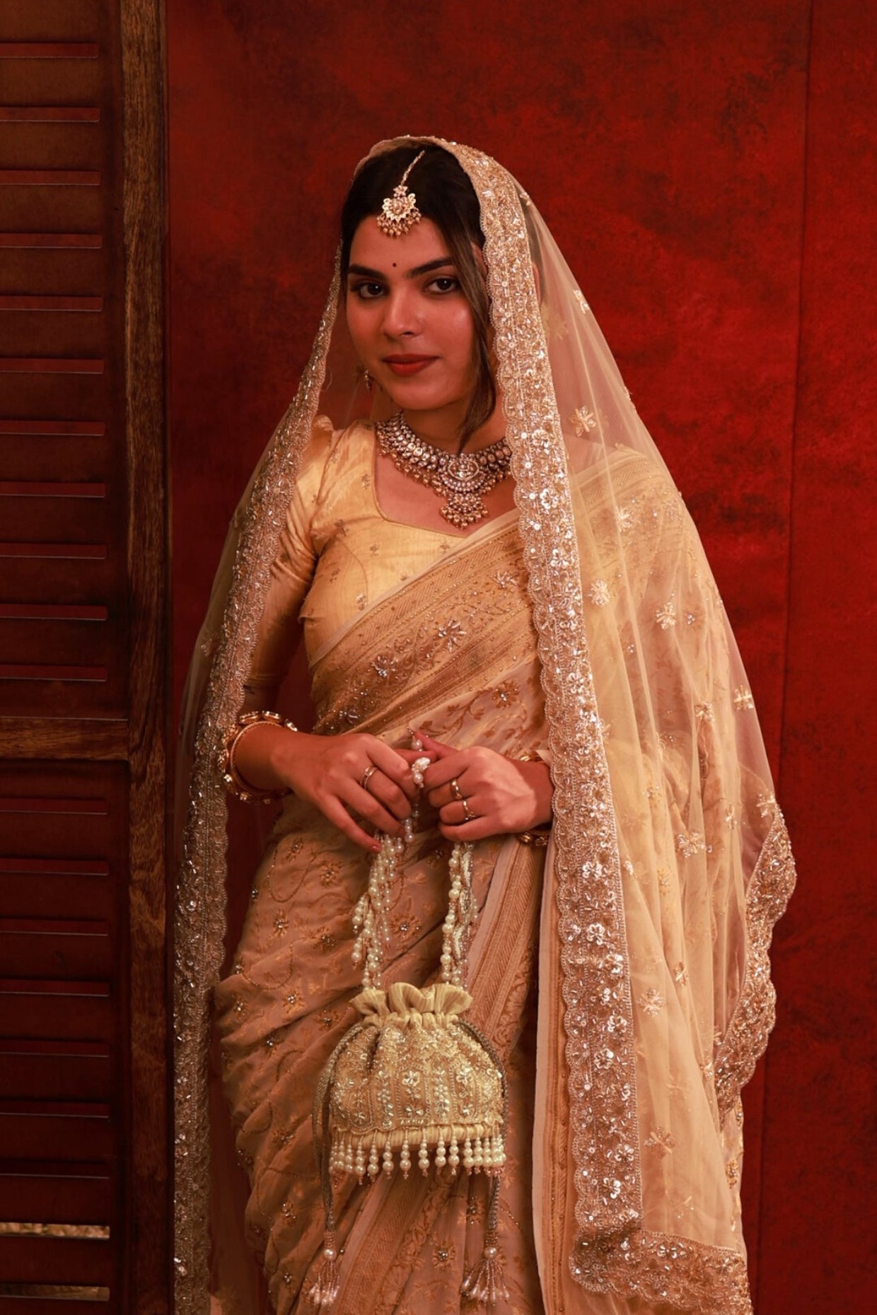 SAJNI PEARL EMBROIDERED MINI POTLI - GOLD