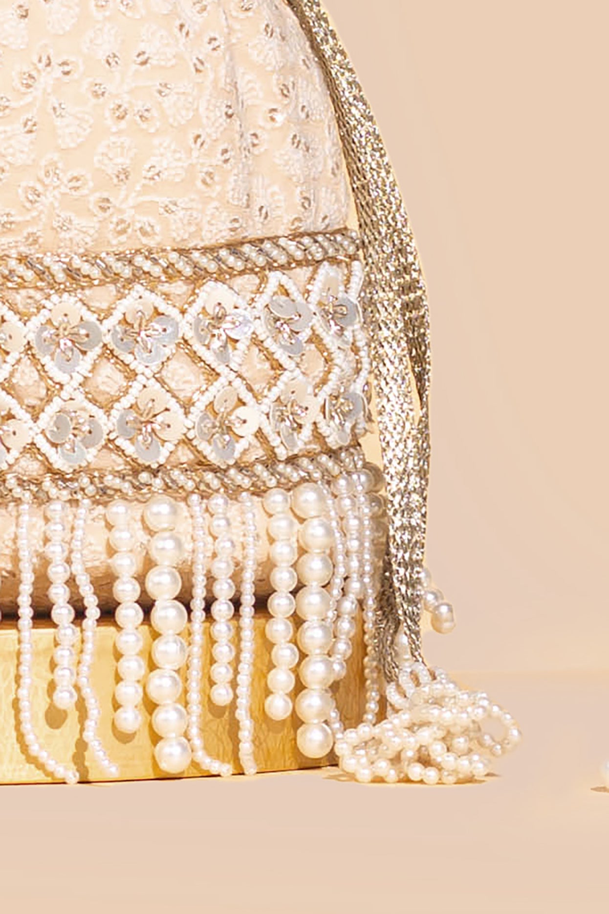 AMARA EMBROIDERED BUCKET BAG - NUDE