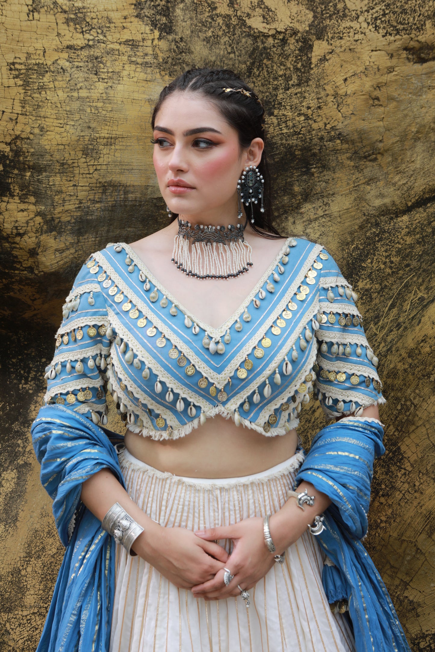 DEVI DRAPE IVORY MAL LEHANGA WITH DENIM LACE EMBELLISHED BLOUSE AND DENIM BLUE CRUSHED DUPATTA