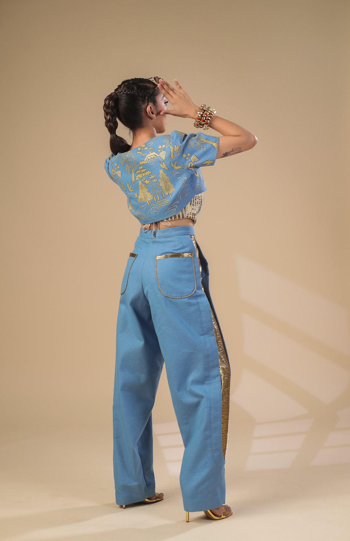 DENIM CROP JACKET WITH GOLD AND IVORY PLEATED CORSET WITH DENIM PANT