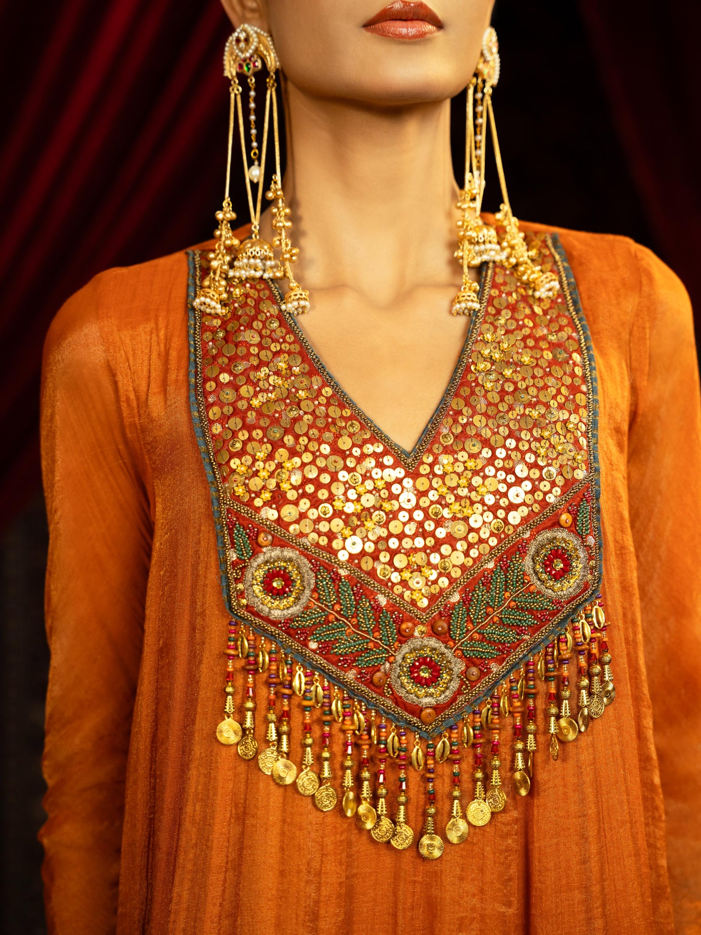 TERRACOTTA RUST ANARKALI GOWN WITH GEOMETRIC HEMLINE