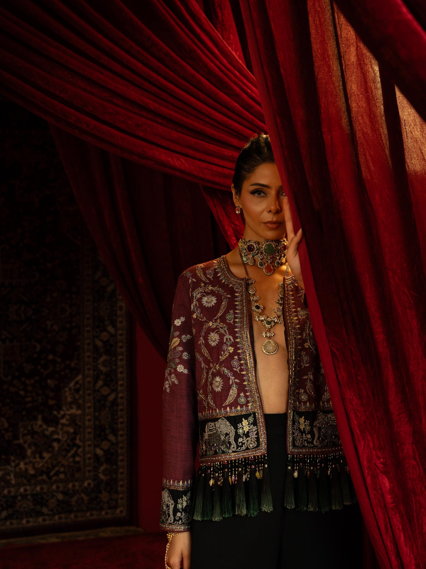 MAUVE EMBROIDERED SHORT JACKET WITH JEWEL BEADS & TASSELS PAIRED WITH BLACK FLARED PANTS