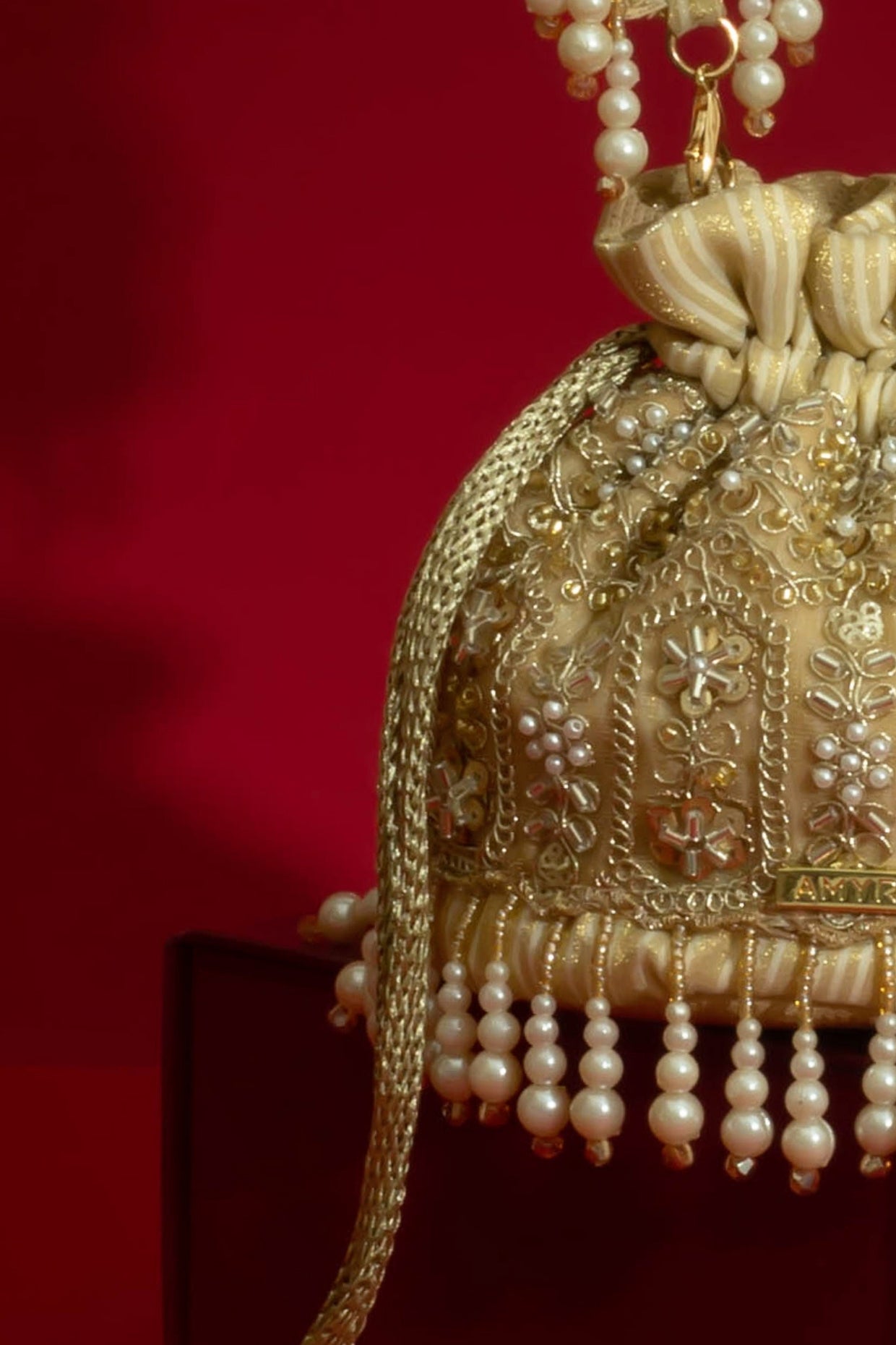 SAJNI PEARL EMBROIDERED MINI POTLI - GOLD