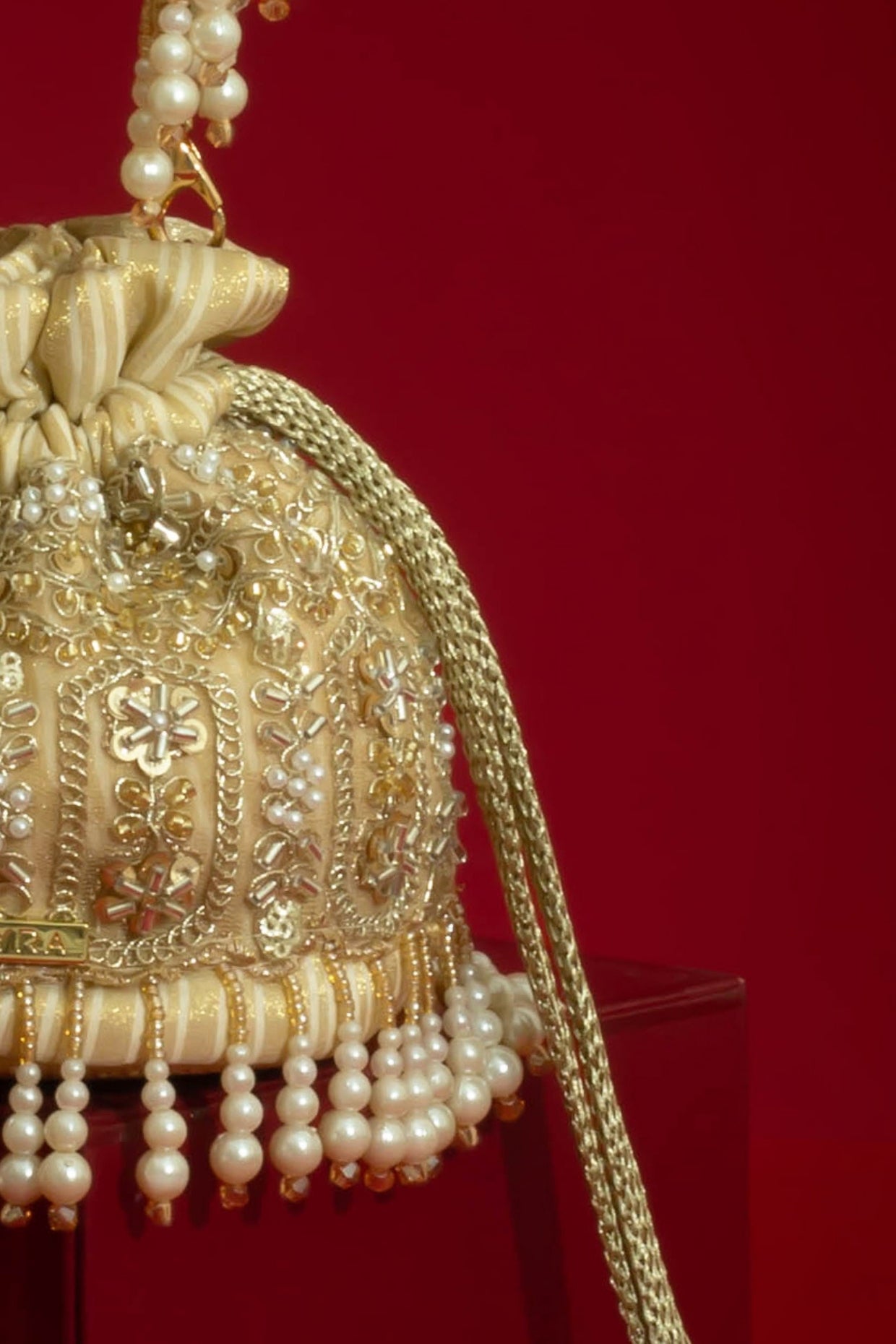 SAJNI PEARL EMBROIDERED MINI POTLI - GOLD