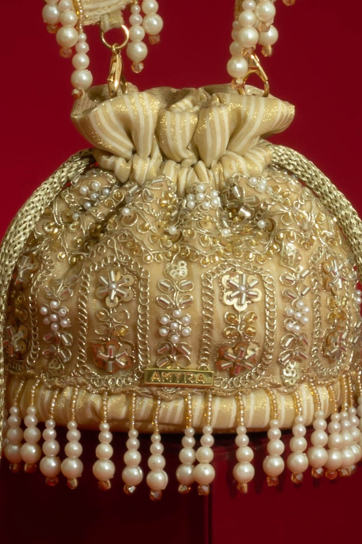 SAJNI PEARL EMBROIDERED MINI POTLI - GOLD