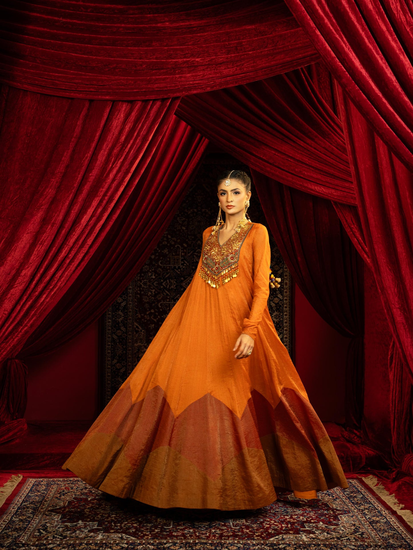 TERRACOTTA RUST ANARKALI GOWN WITH GEOMETRIC HEMLINE