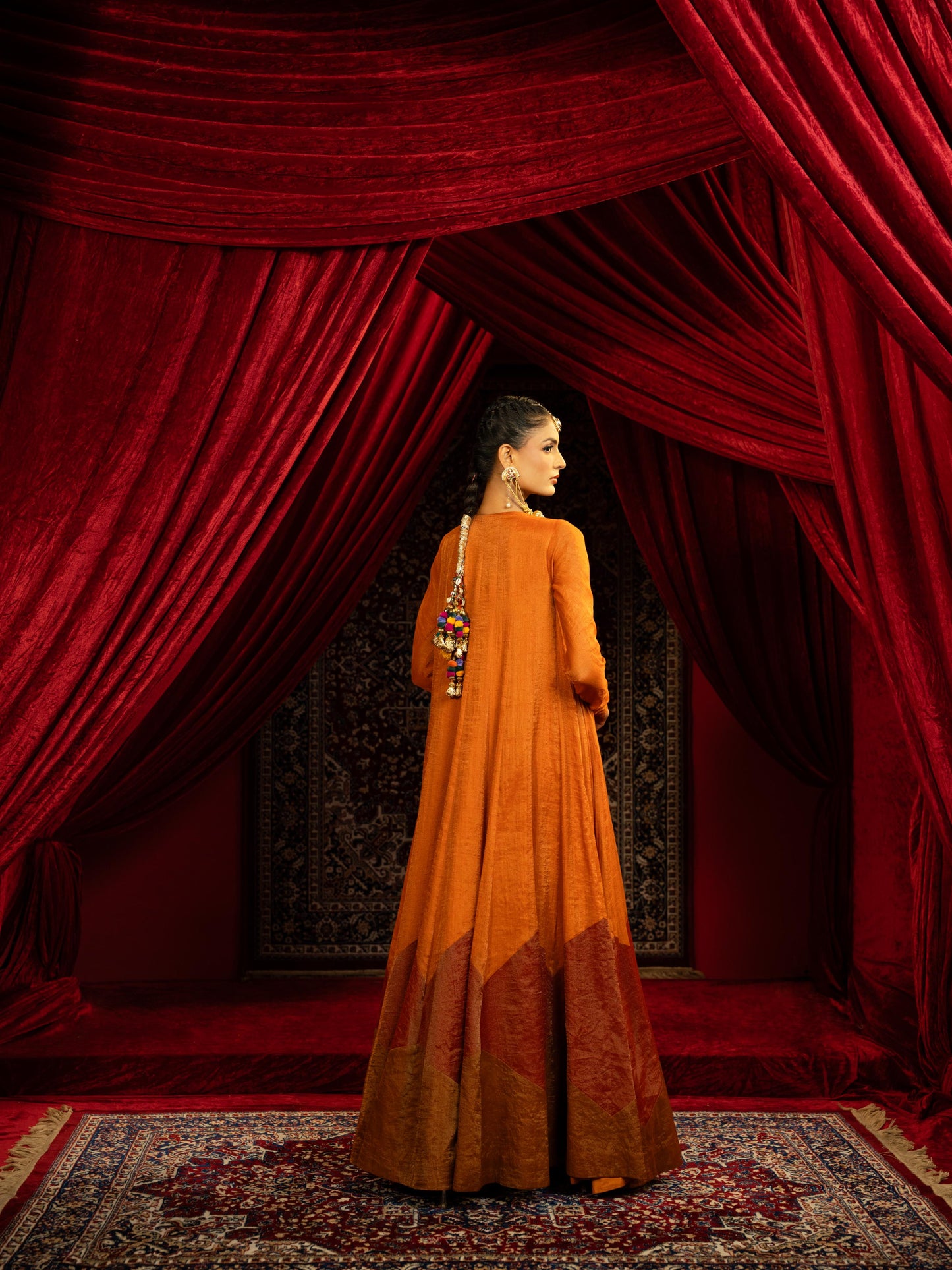 TERRACOTTA RUST ANARKALI GOWN WITH GEOMETRIC HEMLINE