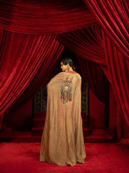 CRIMSON RED QUILTED BLOUSE WITH BOX PLEATED PANTS & SEPIA BROWN CAPE