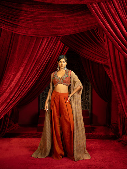 CRIMSON RED QUILTED BLOUSE WITH BOX PLEATED PANTS & SEPIA BROWN CAPE