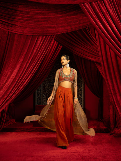 CRIMSON RED QUILTED BLOUSE WITH BOX PLEATED PANTS & SEPIA BROWN CAPE