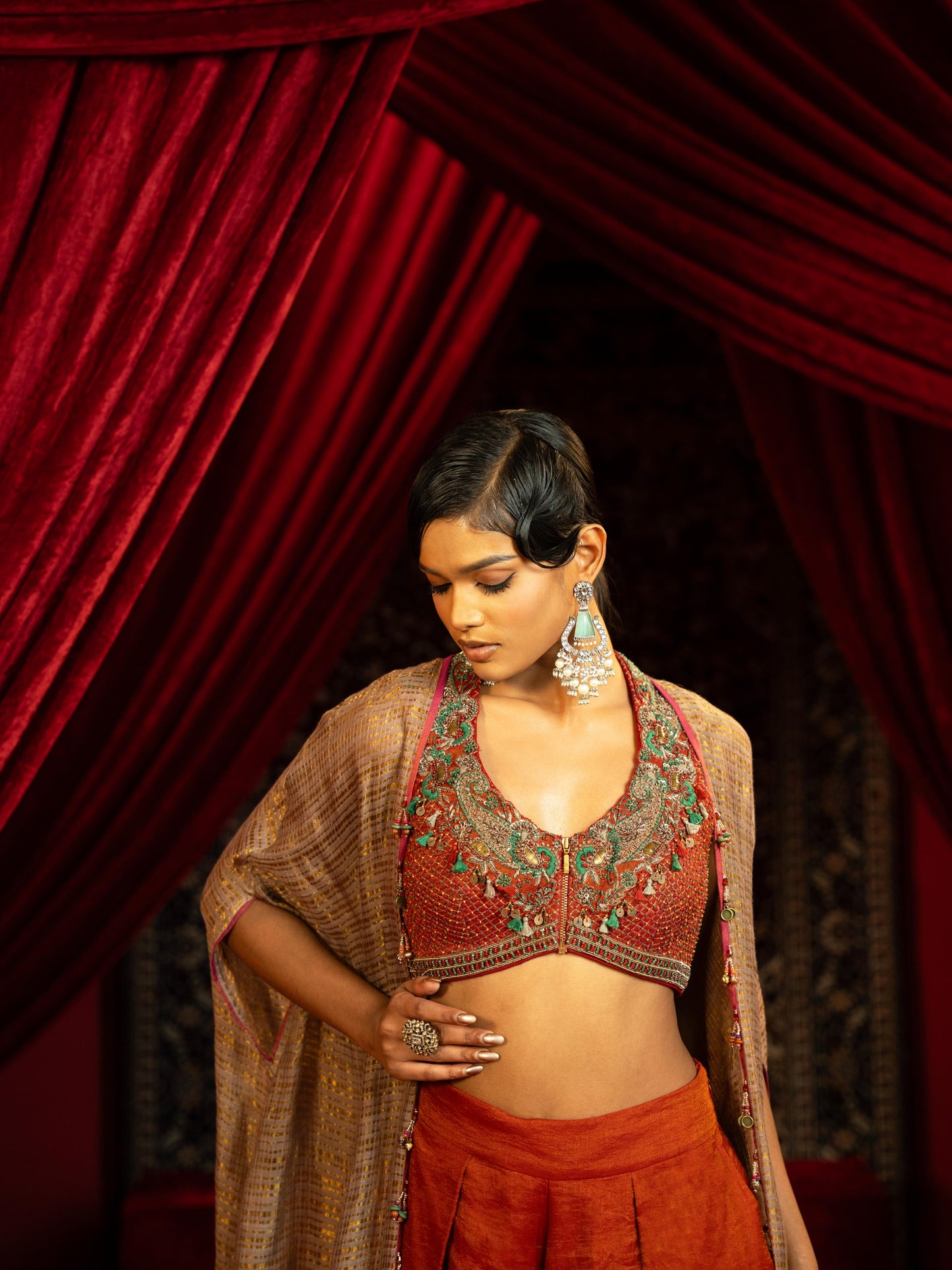 CRIMSON RED QUILTED BLOUSE WITH BOX PLEATED PANTS & SEPIA BROWN CAPE
