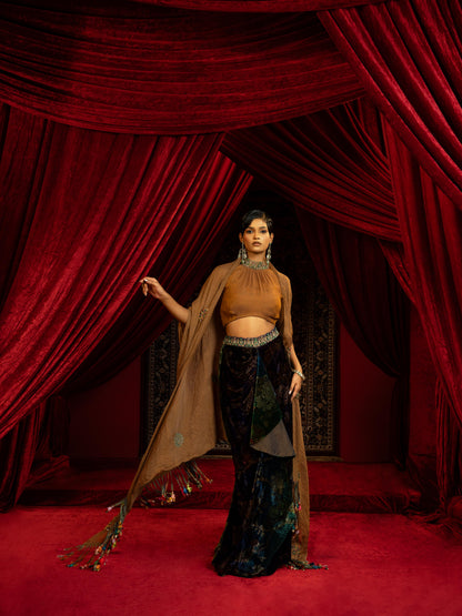 PRINTED VELVET DRAPE SKIRT WITH RUCHED HALTER BLOUSE & FLOWY DUPATTA CAPE
