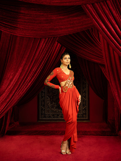 BURNT TERRACOTTA DRAPE SKIRT SET WITH EMBROIDERED CUTWORK PALLA & FULL-SLEEVE BLOUSE