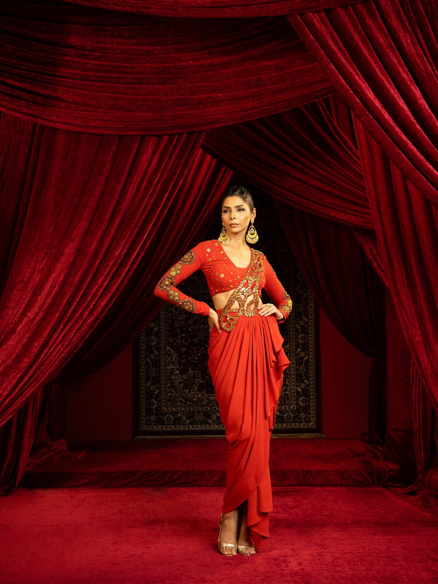 BURNT TERRACOTTA DRAPE SKIRT SET WITH EMBROIDERED CUTWORK PALLA & FULL-SLEEVE BLOUSE