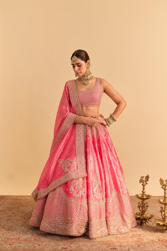 AASHINA - DABKA ZARDOZI EMBROIDERED PURE TISSUE CARROT PINK LEHENGA SET