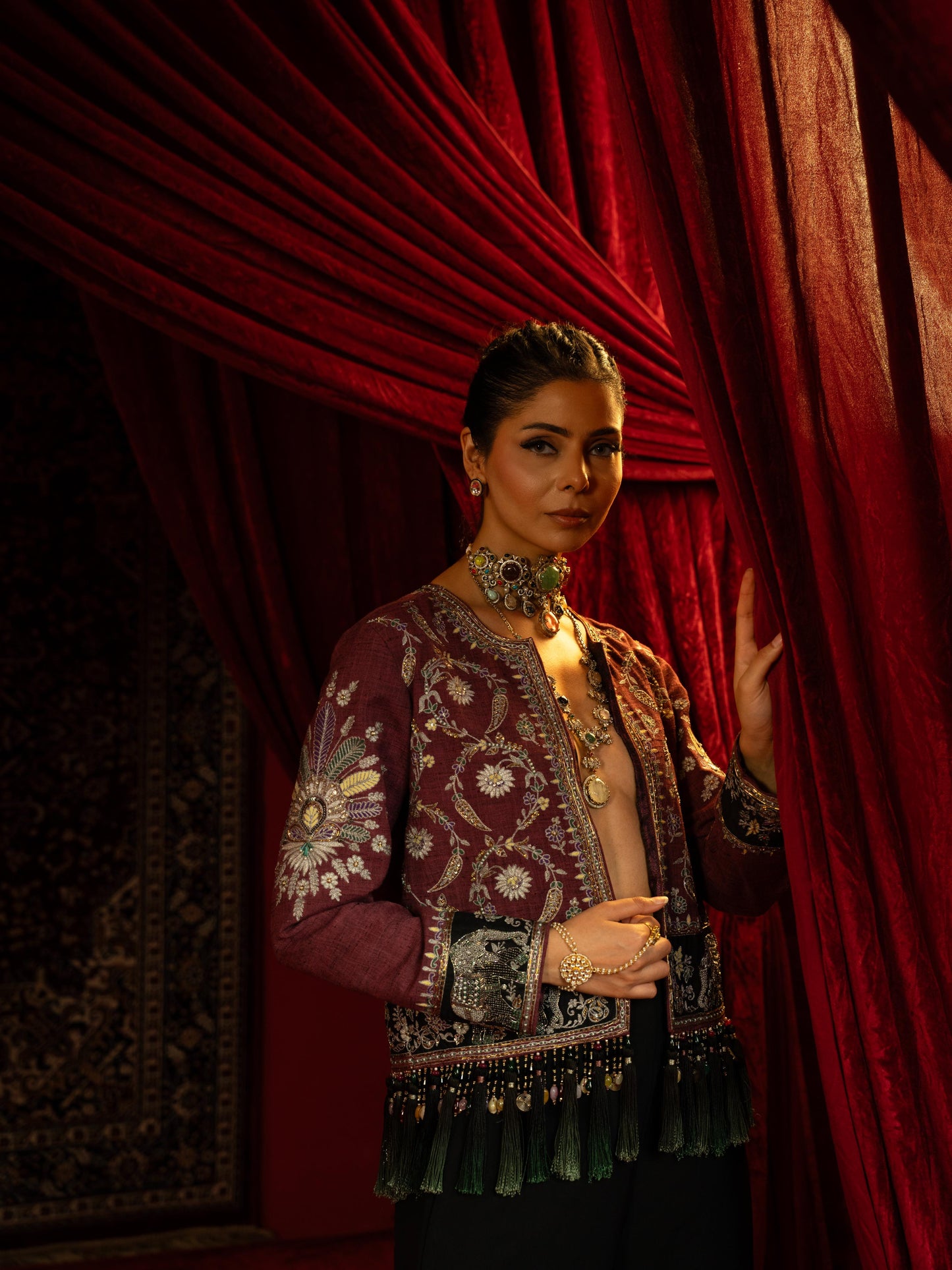 MAUVE EMBROIDERED SHORT JACKET WITH JEWEL BEADS & TASSELS PAIRED WITH BLACK FLARED PANTS