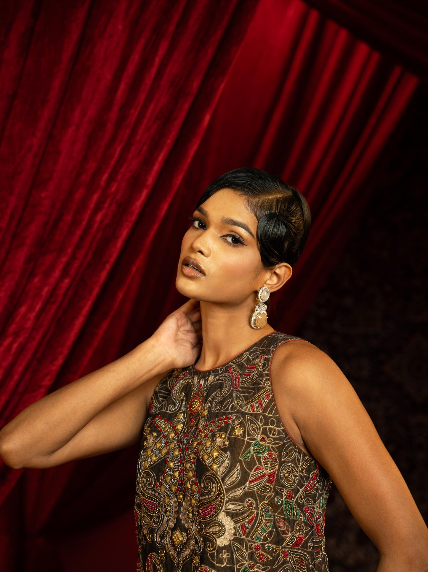 BLACK VINTAGE METAL EMBROIDERED A-LINE SHIFT DRESS WITH JALI HEMLINE & MULTICOLOUR POM-POMS