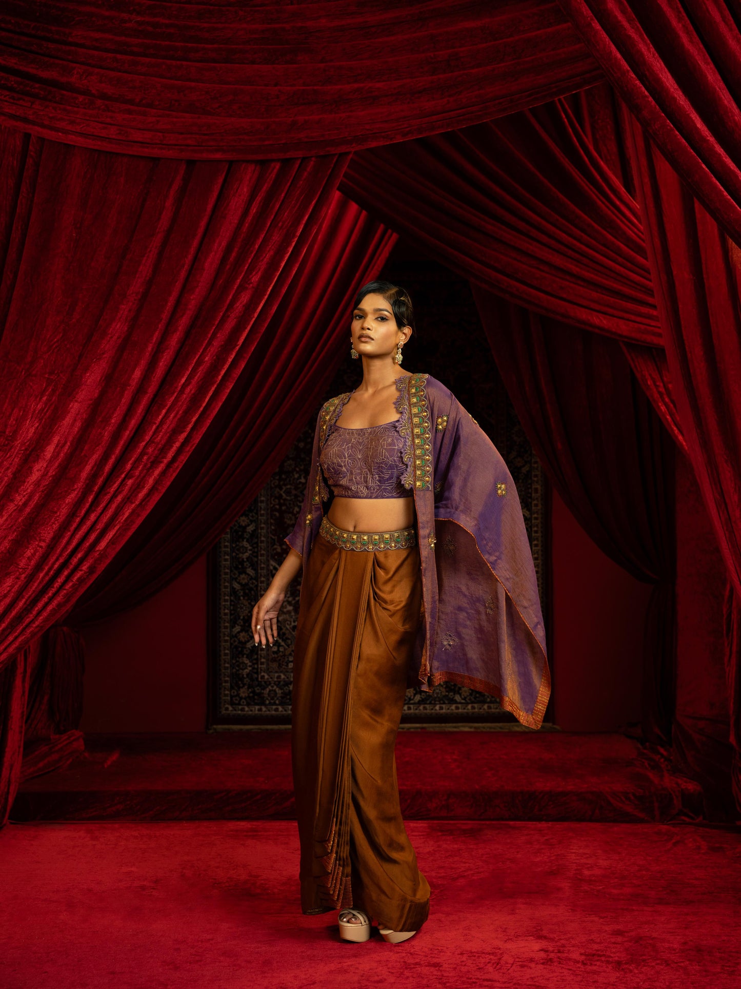 MOCHA MOUSSE DRAPE DHOTI SKIRT SET WITH PURPLE TISSUE QUILTED BUSTIER & CAPE