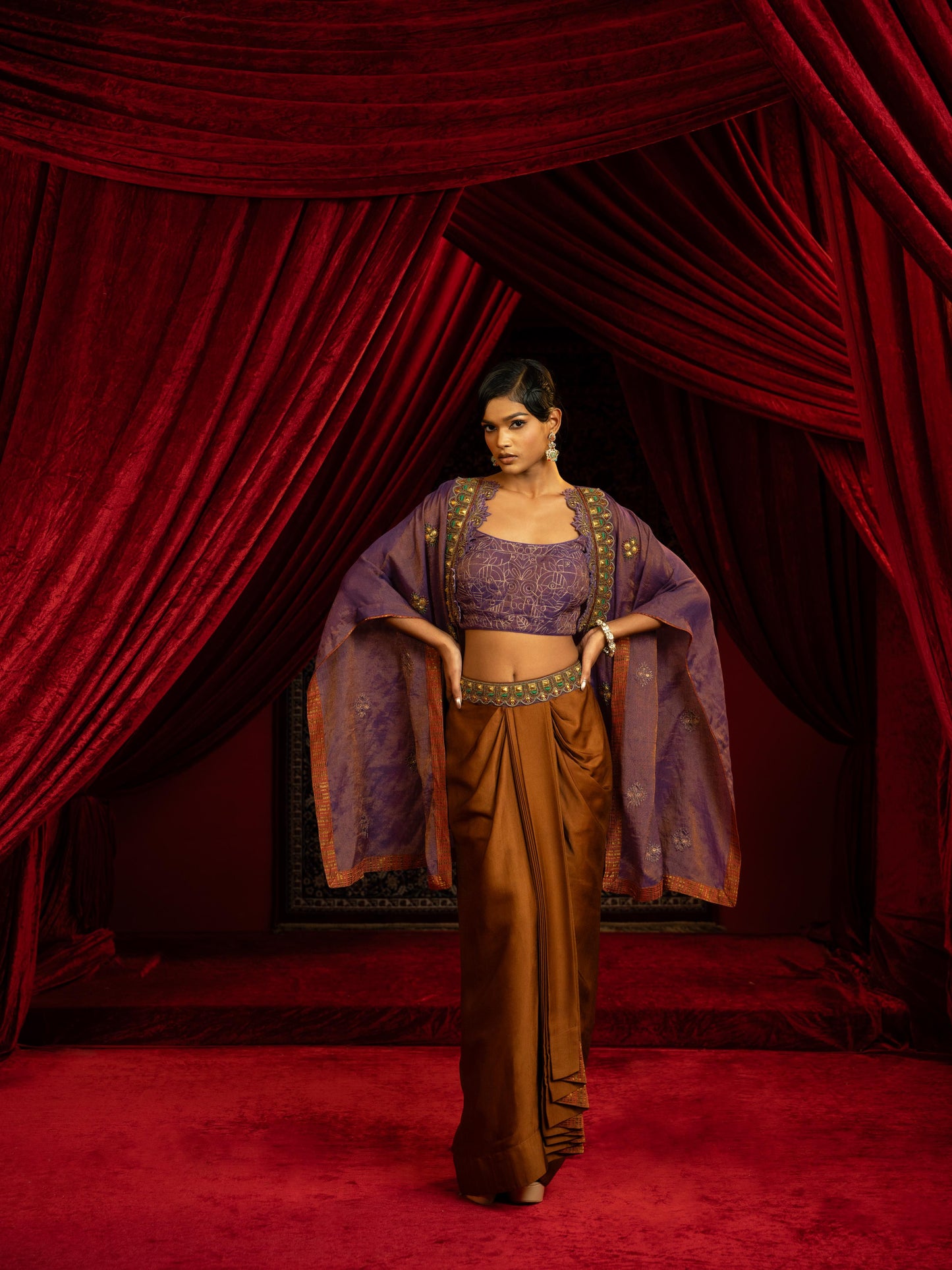 MOCHA MOUSSE DRAPE DHOTI SKIRT SET WITH PURPLE TISSUE QUILTED BUSTIER & CAPE