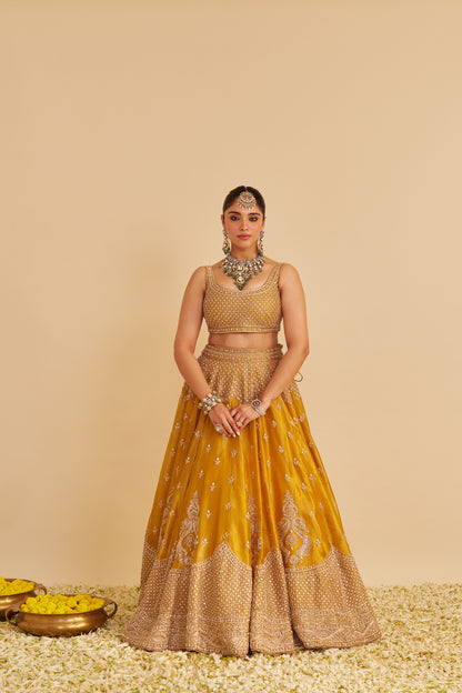AASHINA - DABKA ZARDOZI EMBROIDERED PURE TISSUE MUSTARD LEHENGA SET