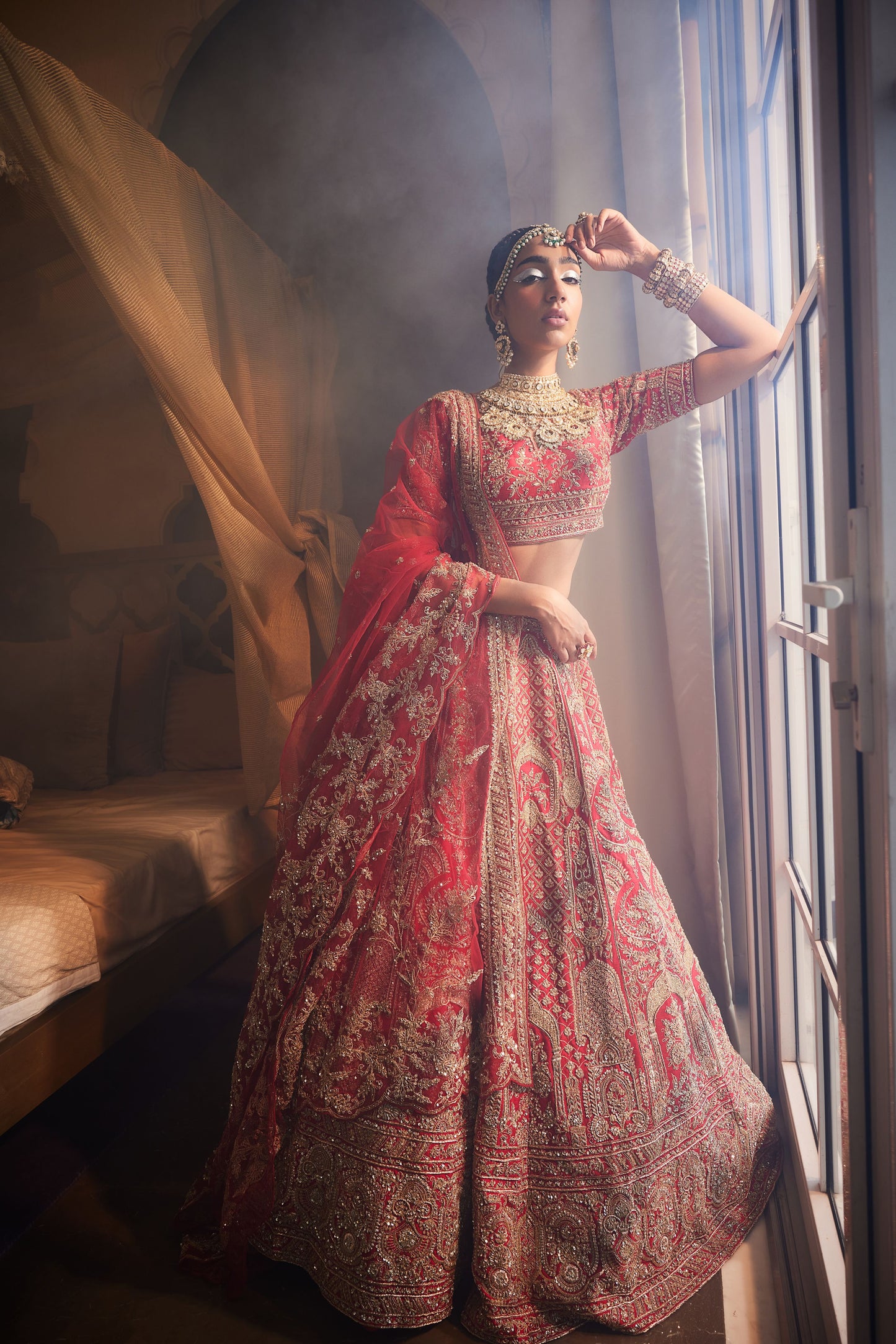 ELNAZ RED HEAVILY EMBROIDERED LEHENGA
