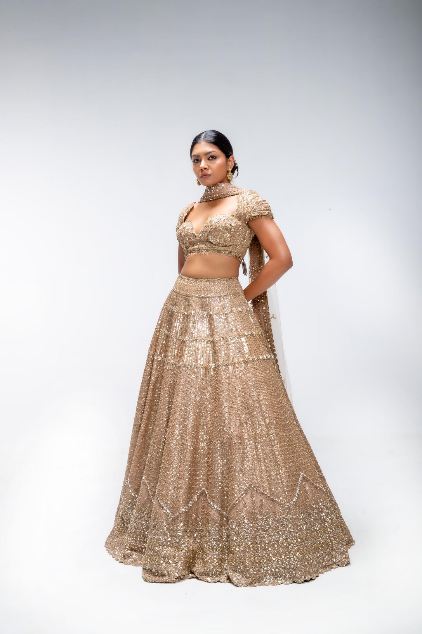 GOLDEN MIRAGE CREST LEHENGA