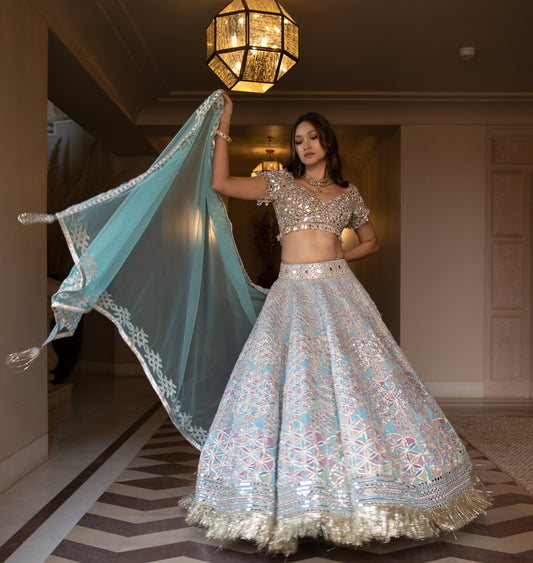 GEOMETRIC PATTERN PRINTED LEHENGA WITH HAND EMBROIDERED BLOUSE