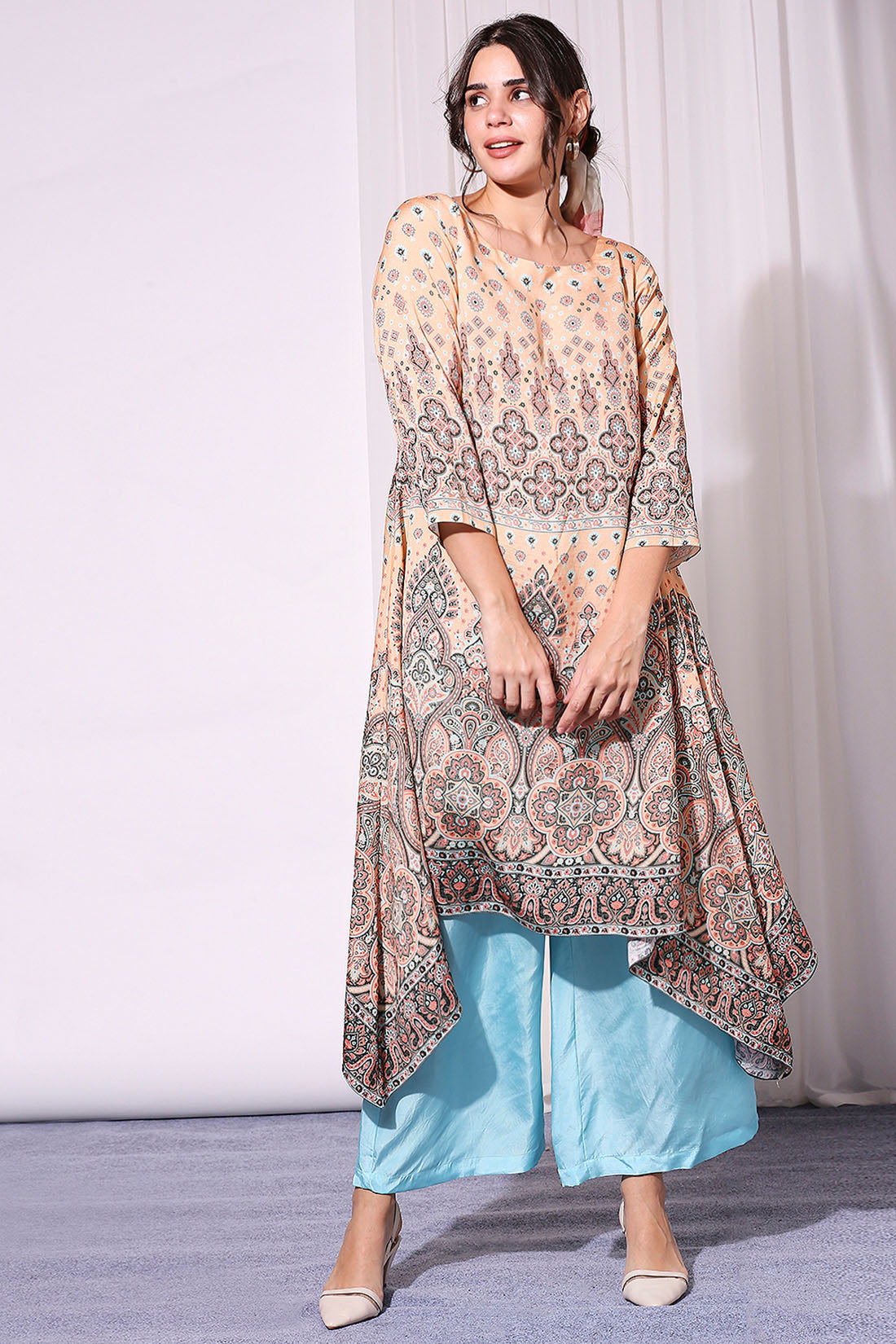 ETHNIC PASTEL PRINTED ASYEMMETRICAL TOP PAIRED WITH PANTS