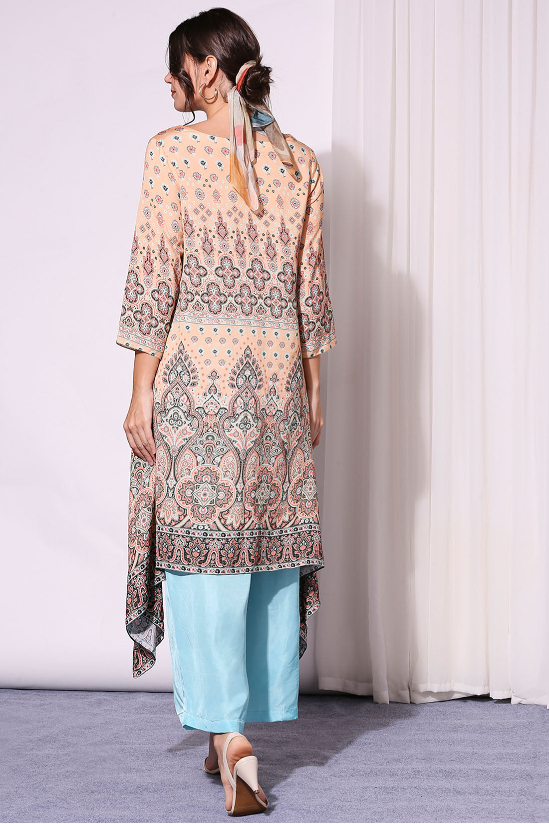 ETHNIC PASTEL PRINTED ASYEMMETRICAL TOP PAIRED WITH PANTS