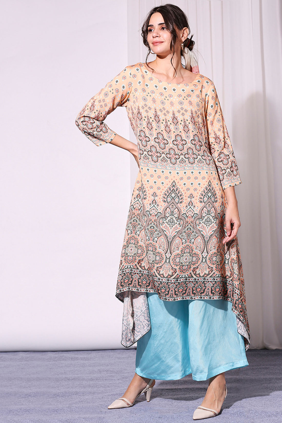 ETHNIC PASTEL PRINTED ASYEMMETRICAL TOP PAIRED WITH PANTS