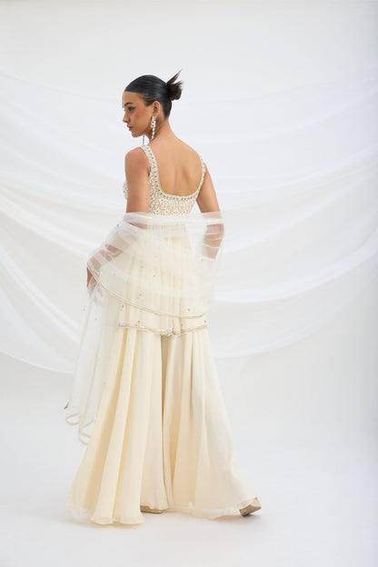 BEIGE SHARARA WITH EMBROIDERED PEPLUM TOP AND DUPATTA - White Maison de Couture